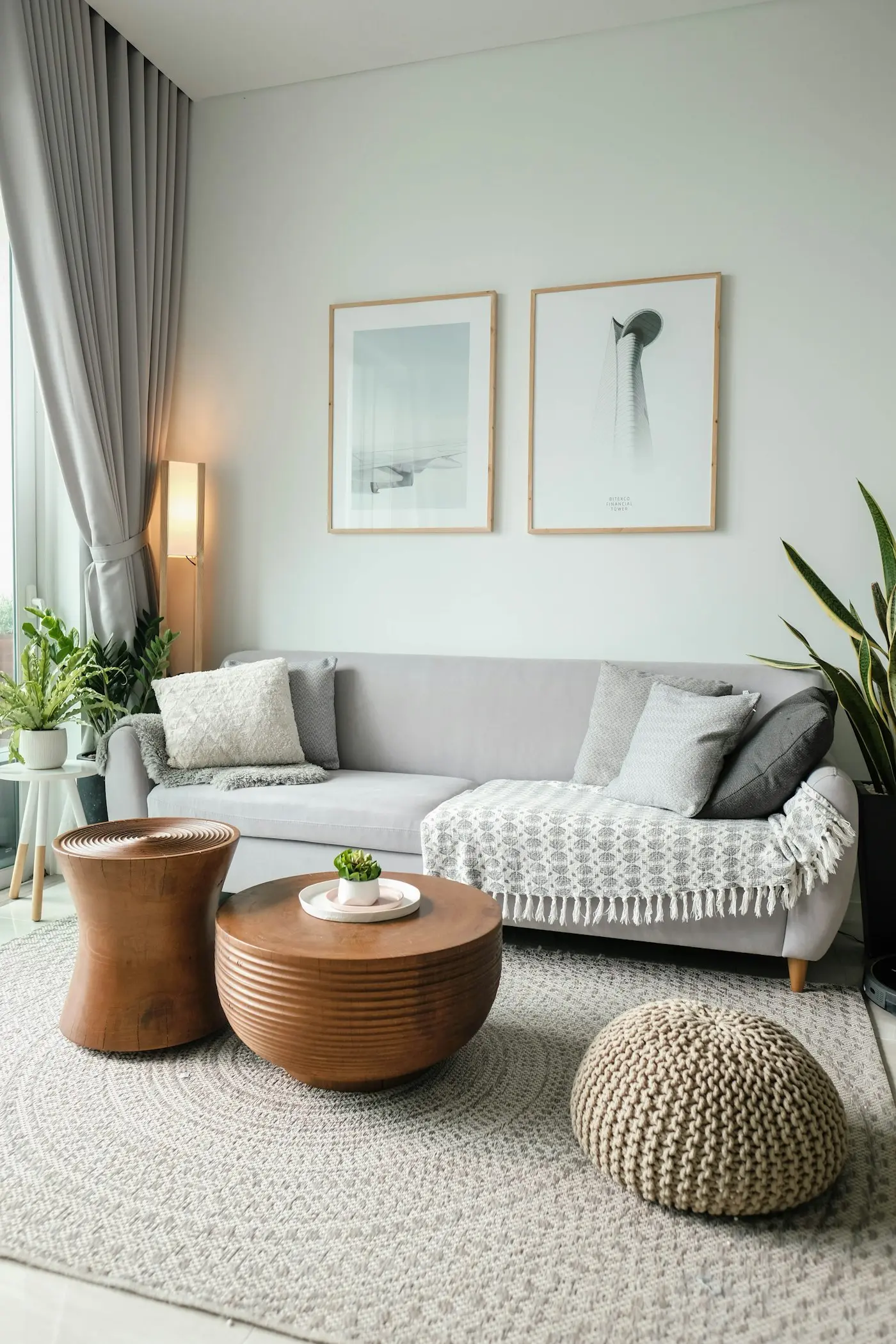 Calm pale-blue living room with neutral furnishings — finished by Jet Painting